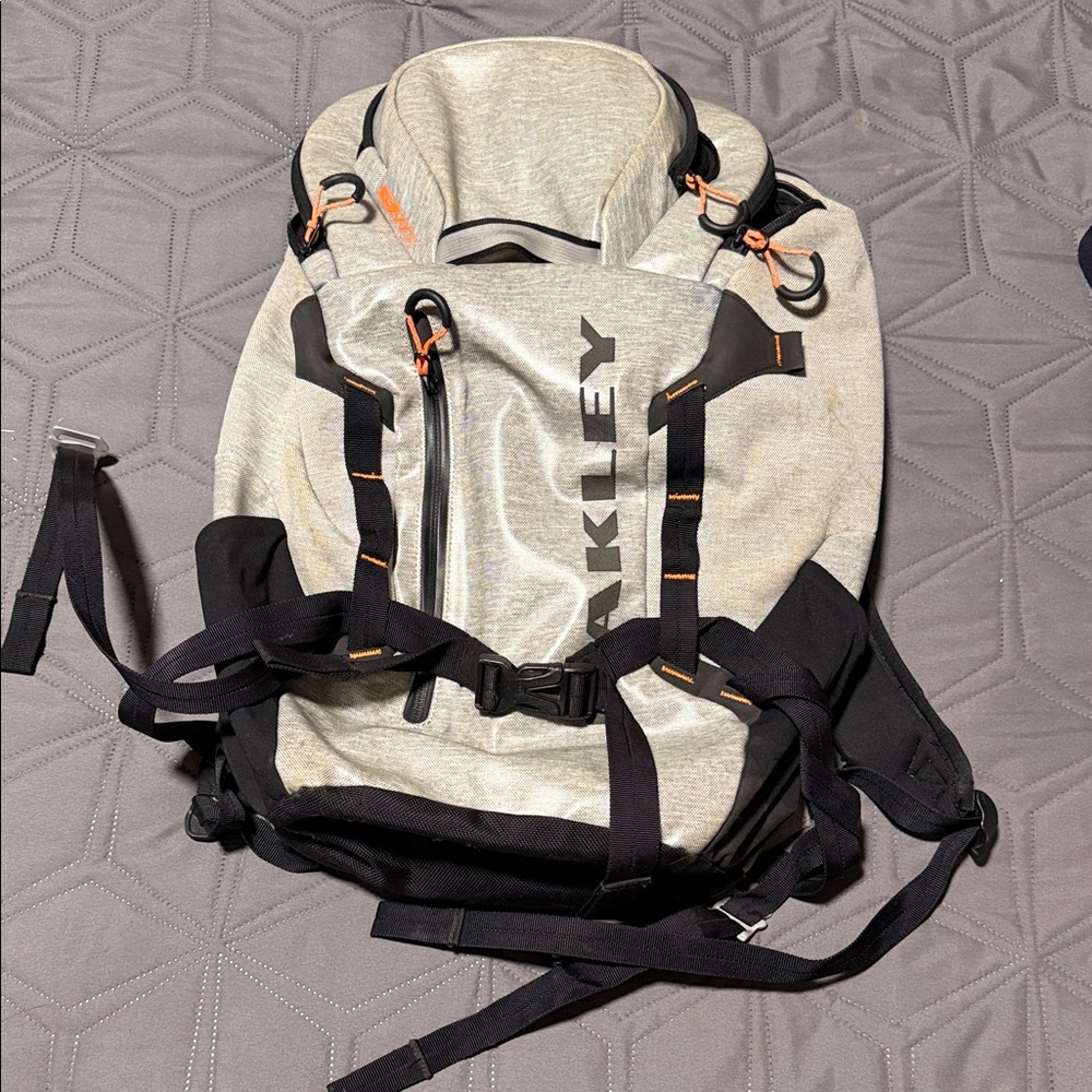 Oakley Light Gray and Black Backpack with Orange Accents